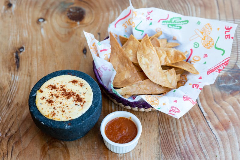 Refried beans side dish with cheese